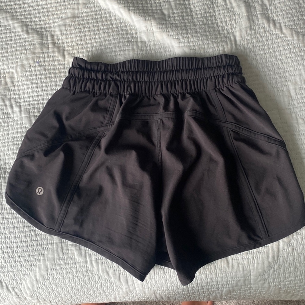 BLACK LULULEMON TRACKER SHORTS